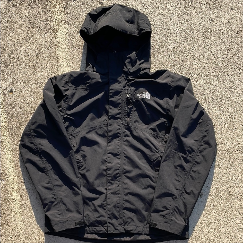 The North Face Black Raincoat with Hood and Water-Resistant Finish